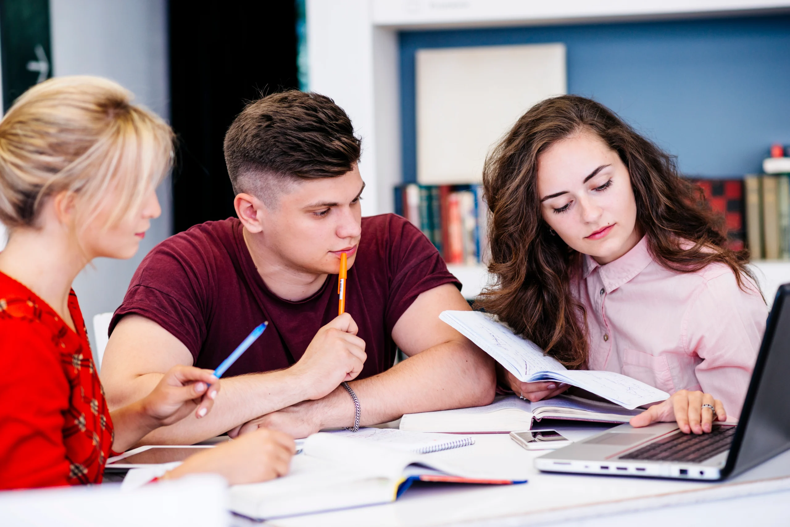 young-people-studying-using-laptop
